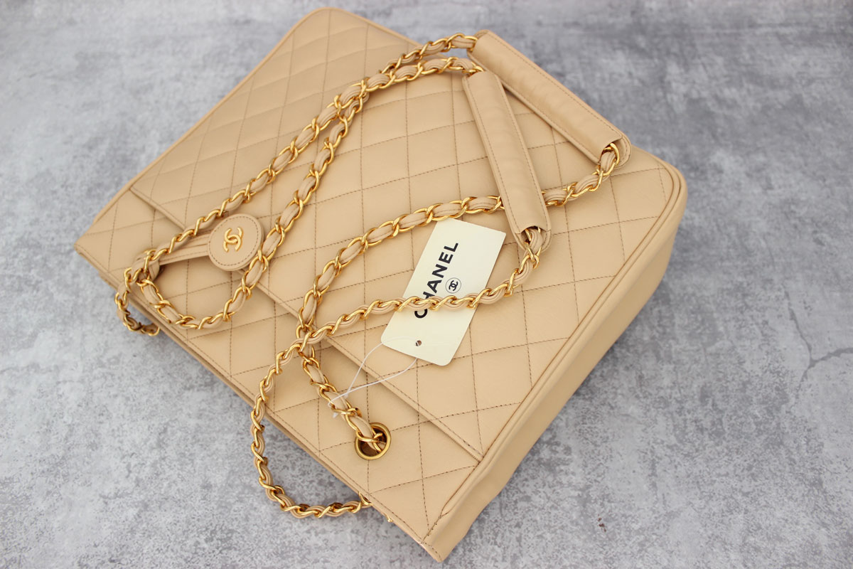 Chanel Beige Quilted Lambskin Tote with CC Charm at Jill's Consignment