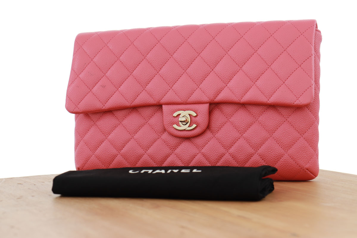 Chanel Pink Caviar Classic Clutch at Jill's Consignment