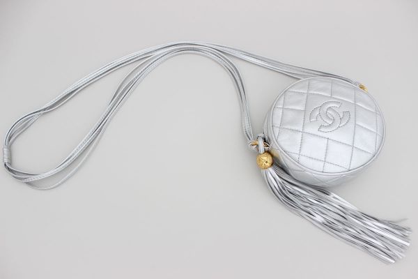 Chanel Metallic Silver Vintage Round Quilted Lambskin CC Tassel Bag