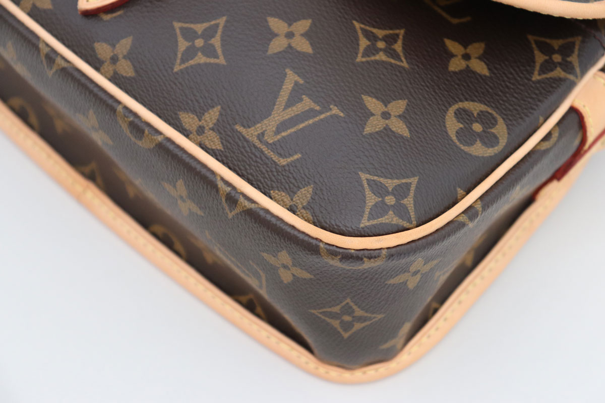 This Vintage LV Sologne is in traditional monogram canvas, brass