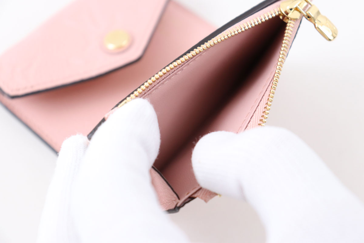 Authentic Louis Vuitton Pink Monogram Empreinte Leather Zoe Wallet – Italy  Station
